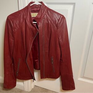 Wine colored Michael Kors leather jacket women’s size M.